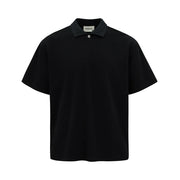 Black polo shirt on a white background