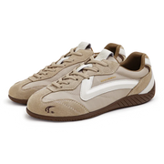 Pair of beige and brown sneakers with white accents on a white background