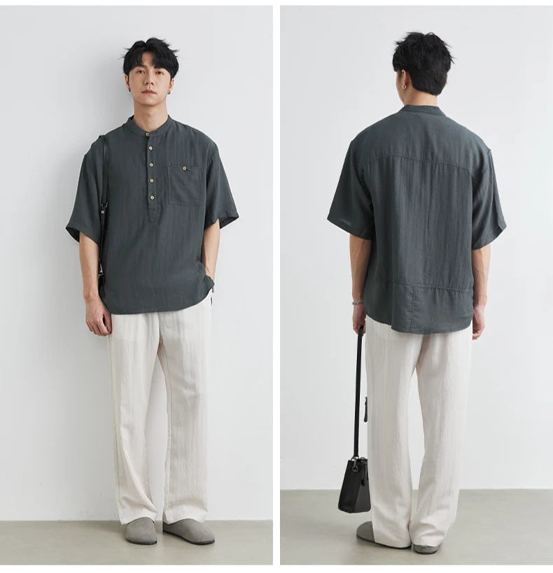 Person wearing a dark gray shirt and light-colored pants, shown from front and back views.