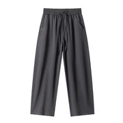 Dark gray pants on a white background