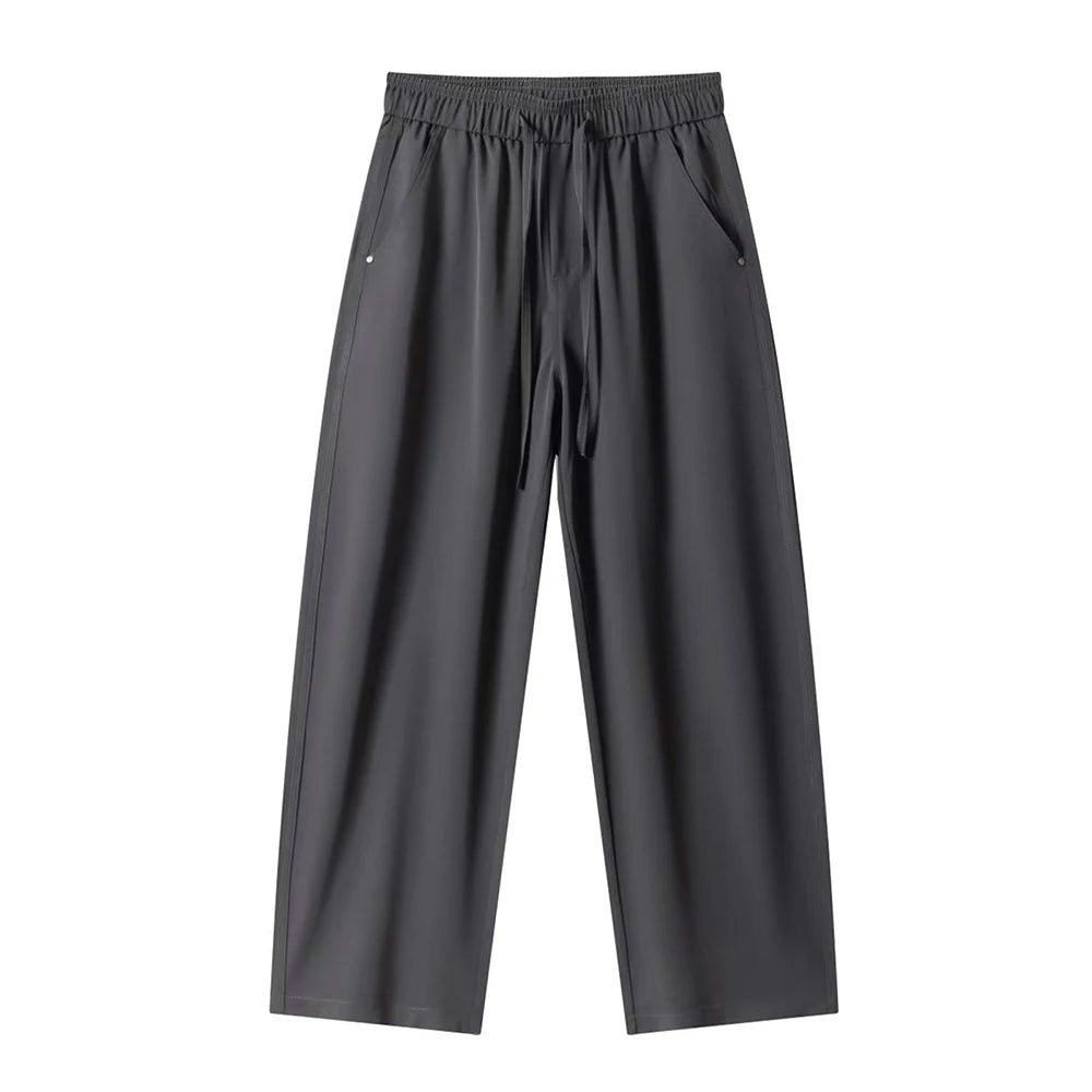 Dark gray pants on a white background