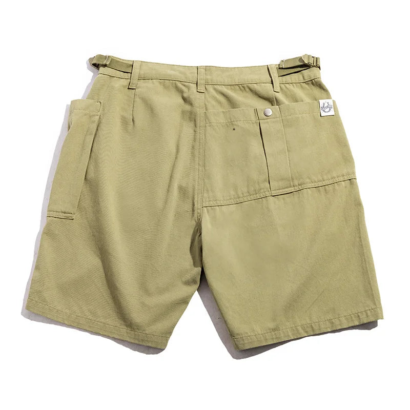 Khaki shorts with a brand logo on a white background