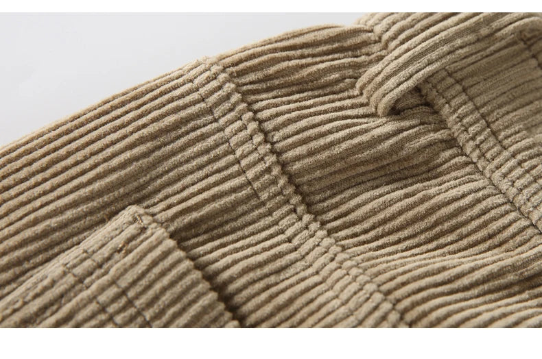 Close-up of beige corduroy fabric texture