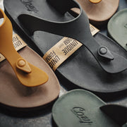 Collection of sandals in various colors.